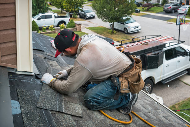 Professional Storm Damage Roof Repair technician working in Milroy, PA